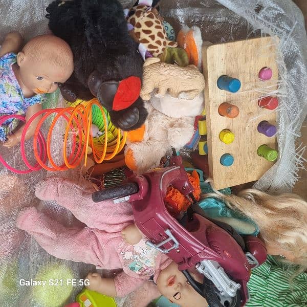 imported lot educational toys , stuff, dolls and cars buy for buisnes 17