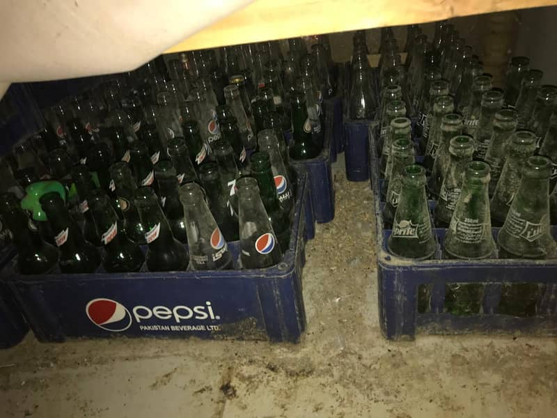 Coke Fridge & Empty Bottles Crate. 2