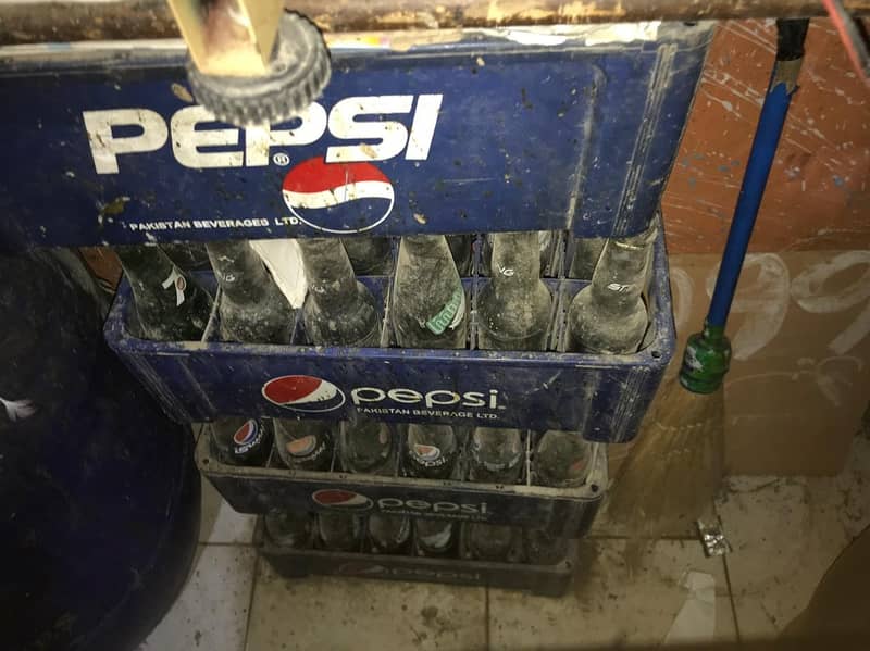 Coke Fridge & Empty Bottles Crate. 5