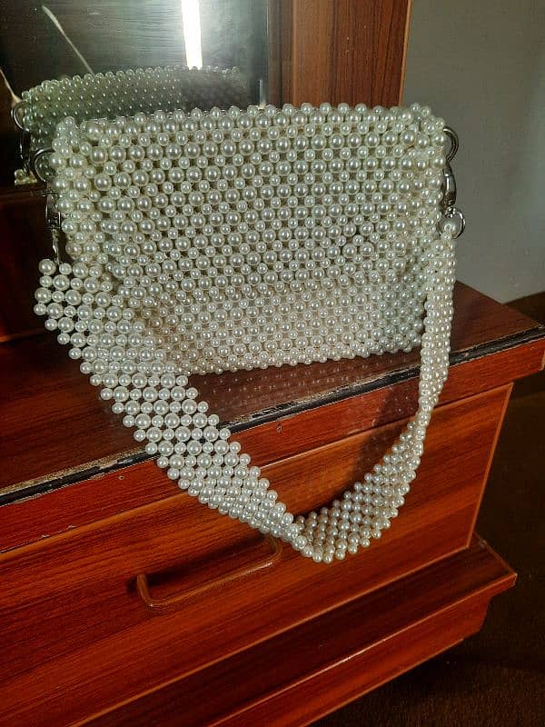 super high quality hand made pearl beaded bags. . . 1