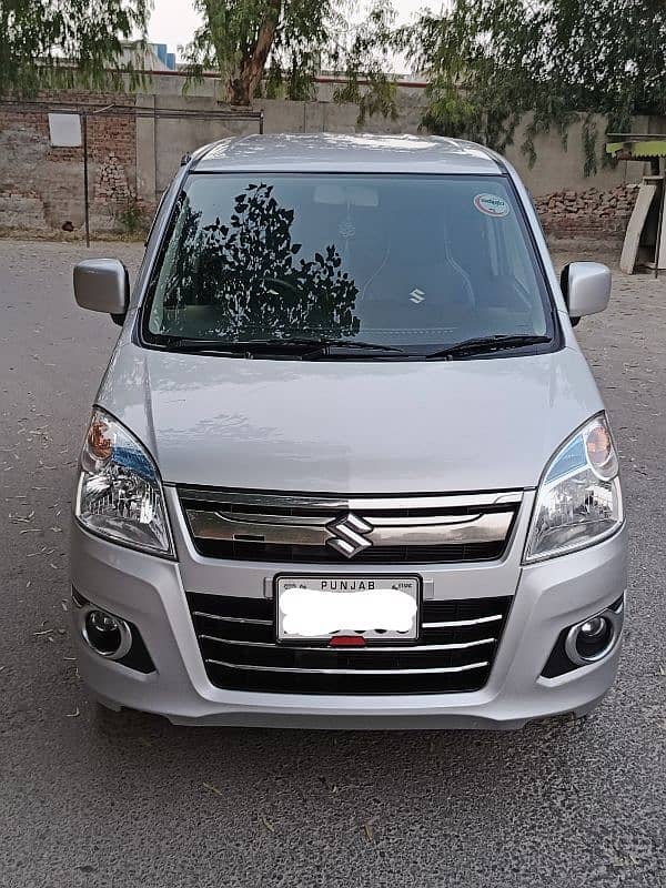 Suzuki wagonr 2021 in total geniune neat clean car 1st ownr low milage 2