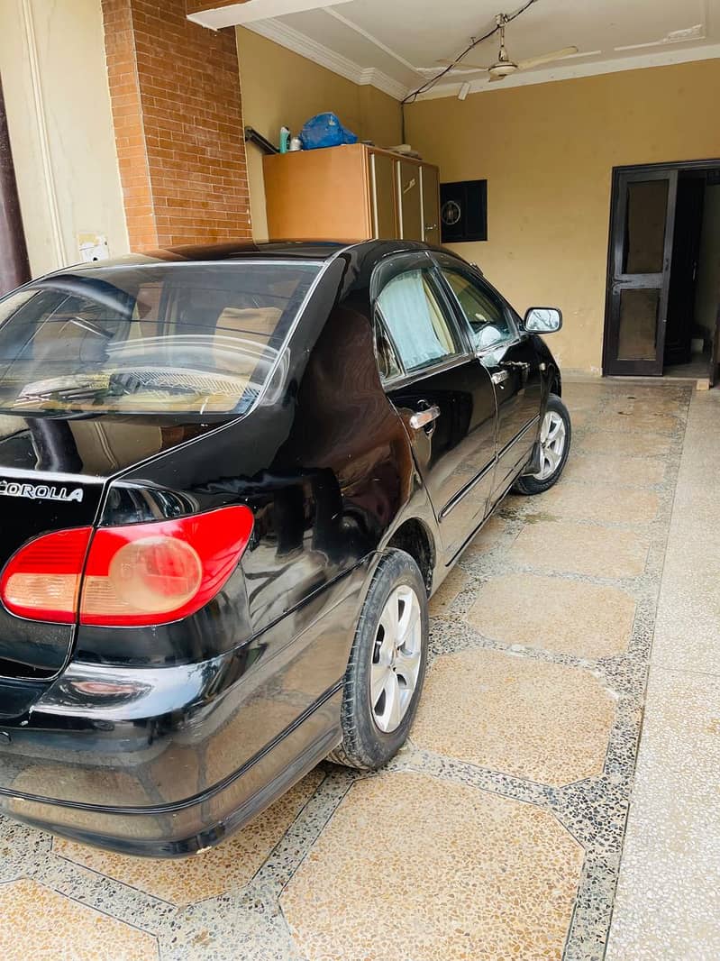 Toyota Corolla GLI 2005 Islamabad reg 11