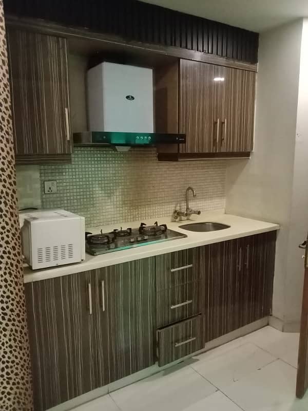 1BED STUDIO FURNISHED APORTMENT IS AVAILABLE FOR RENT IN SECTOR B BAHRIA TOWN LAHORE 0