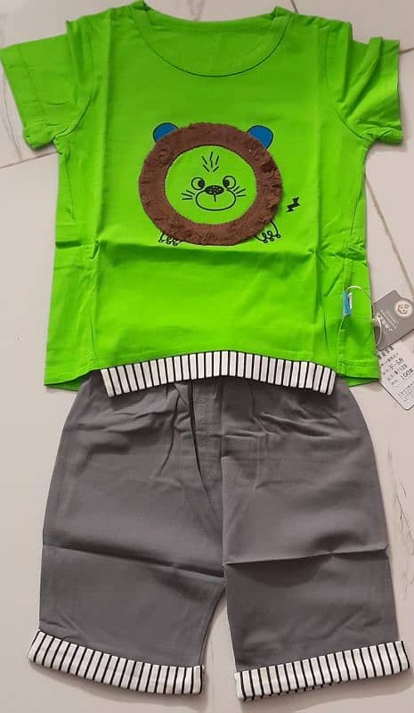 Unisex kids clothes. 0