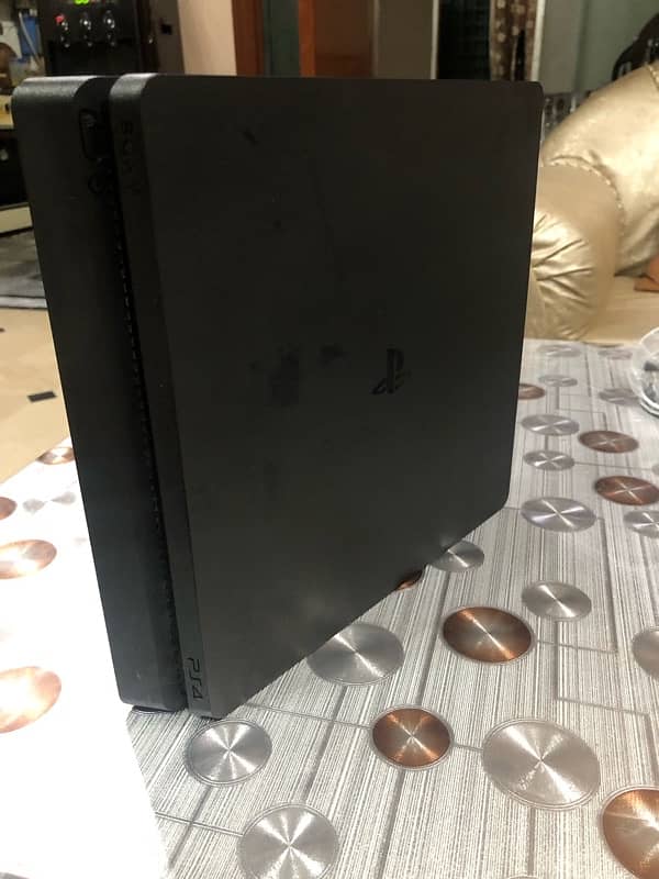 Ps4 slim 500 gb with 2 games( price negotiable) 1