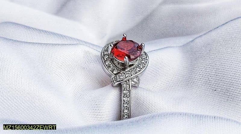 red zircon ring 0