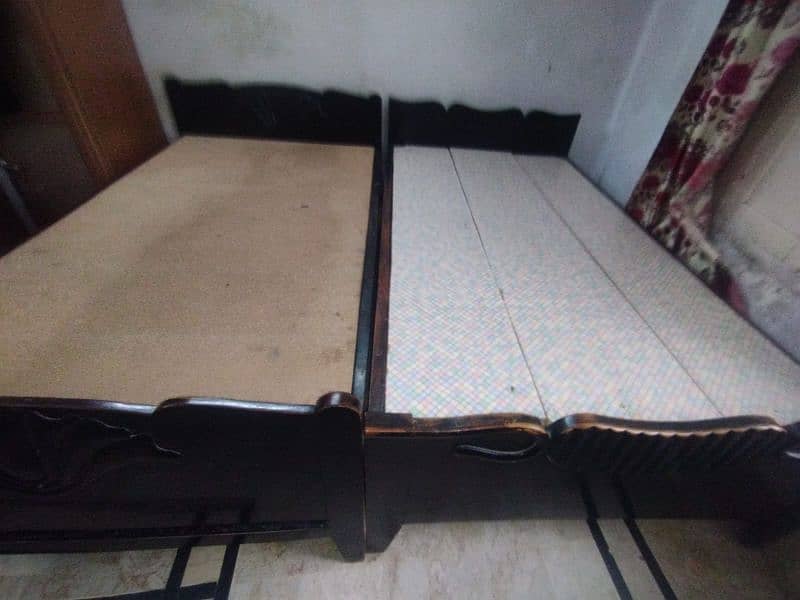 two beds in excellent condition of deyaar wood 4