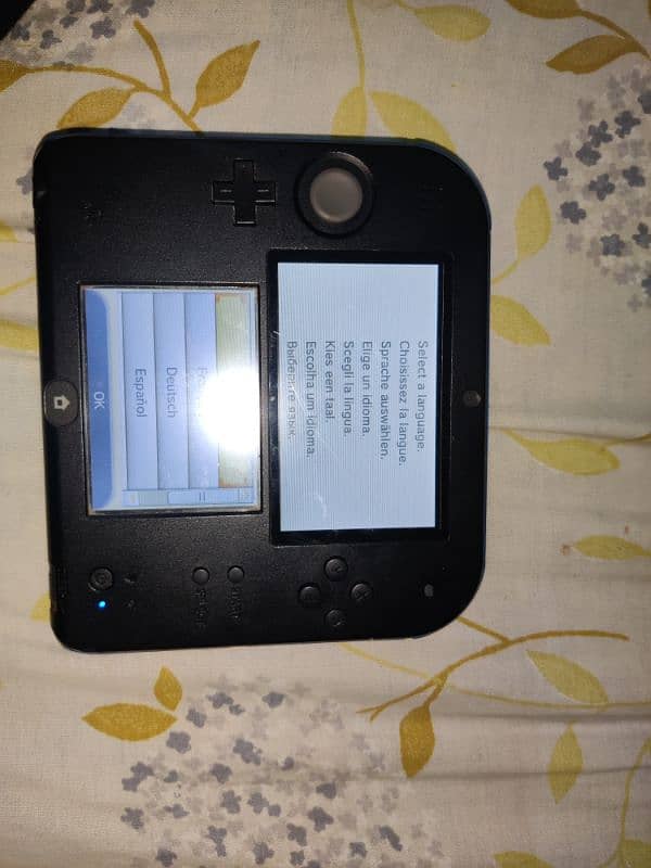 Nintendo 2DS with game charger 4