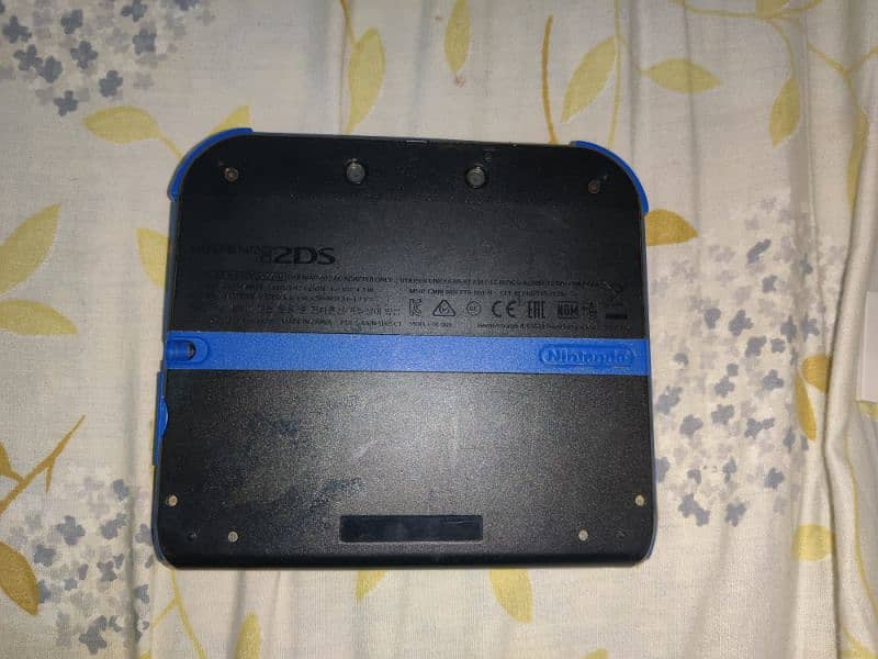 Nintendo 2DS with game charger 5