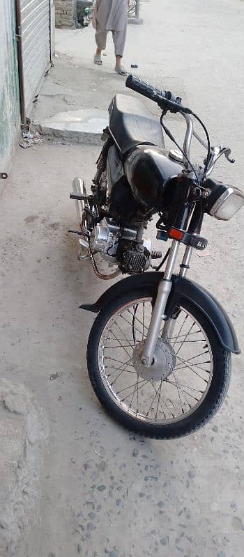 Ravi bike ha urgent sale Karna ha only call 0334 8977842 2