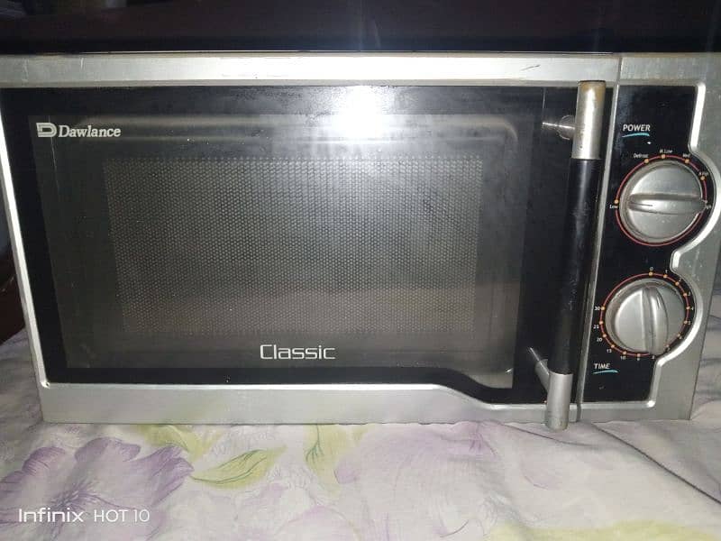 Dawlance microwave oven urgent for sale working well. 5