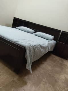 Good quality double bed with 2 side tables for sale