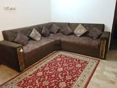 Brown L shaped sofa