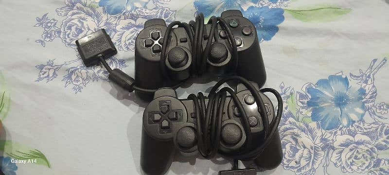 PS 2 WITH CONTROLLERS AND WITH ALL LEADS NEW BUT NO GAMES 03224089384 5