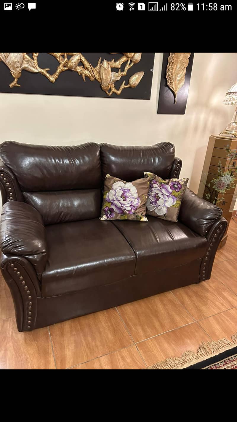 Leather5 seater sofa , chocolate brown colour. Negotiable. Verygood c. 3