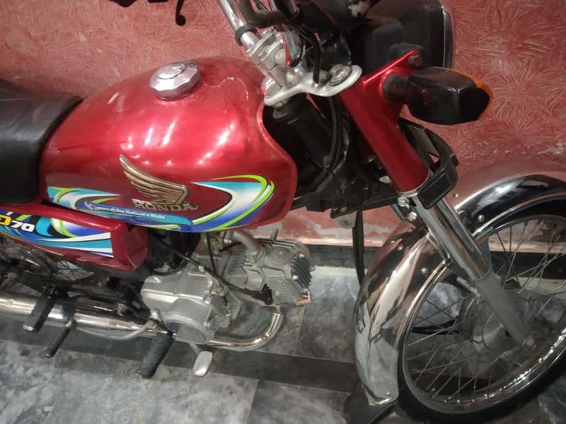 Honda CD 70 red colour 3