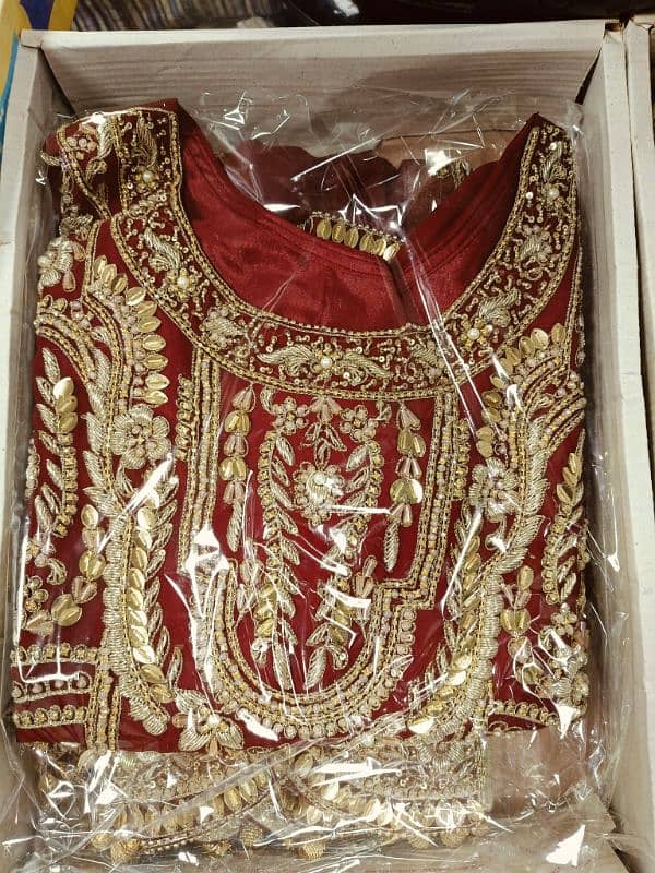 Bridal lehnga for sale untouch color is mehroon 1