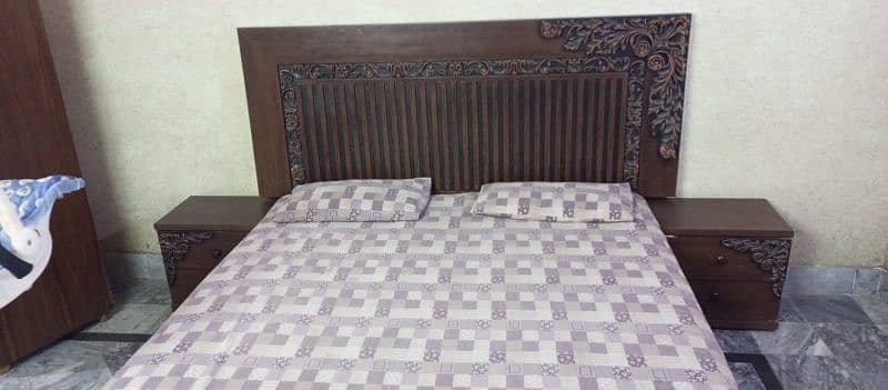 king size bed with side table 0