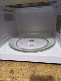 microwave  1year used color is Black