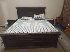 King size bed with side tables and dressing table