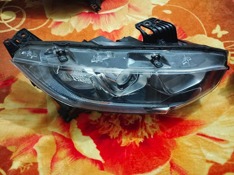 Honda civic 18 model head lights number 03340560237 3