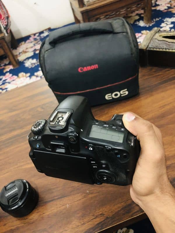 Canon 60D with 50 mm lens & 75-300 canon lens 4