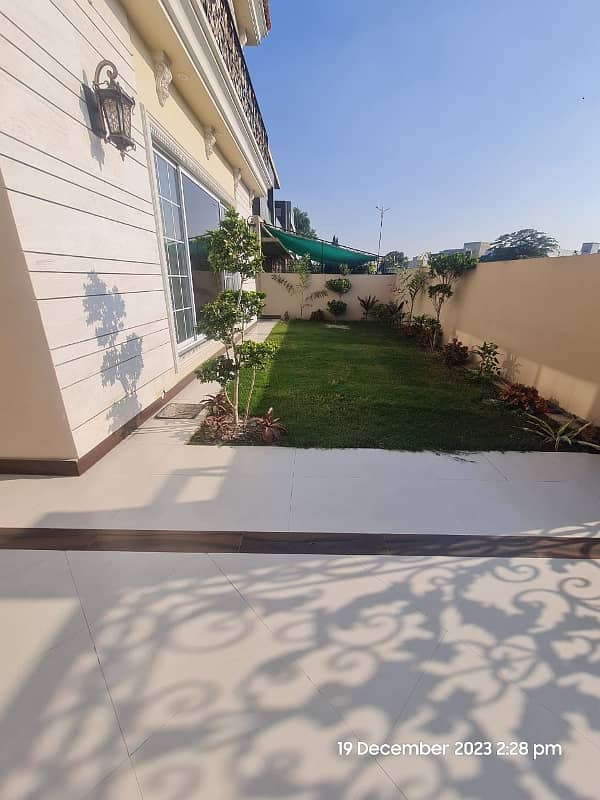 1 Kanal Brand New Super Hot Located Bungalow On Main Road With Full Basement And Home Theatre Is Available For Rent In The Best Block Of DHA Phase 6 Lahore Opposite To Lahore Garrison University 1