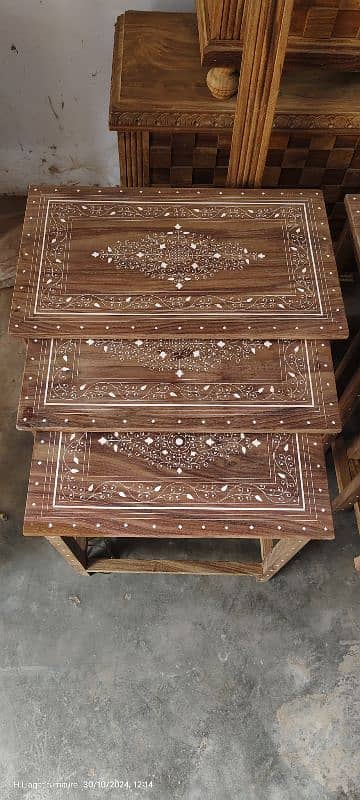 nesting table  full of plastic work 3