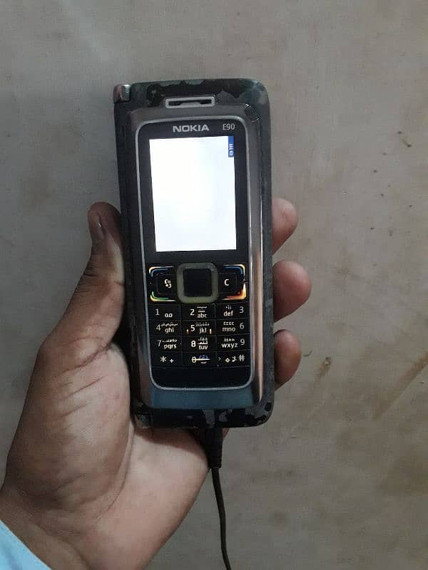 Nokia E90 all ok sim working non pta back cover nhi hai bs 1