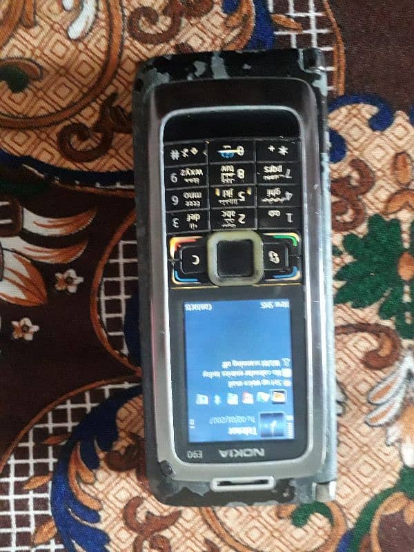 Nokia E90 all ok sim working non pta back cover nhi hai bs 5