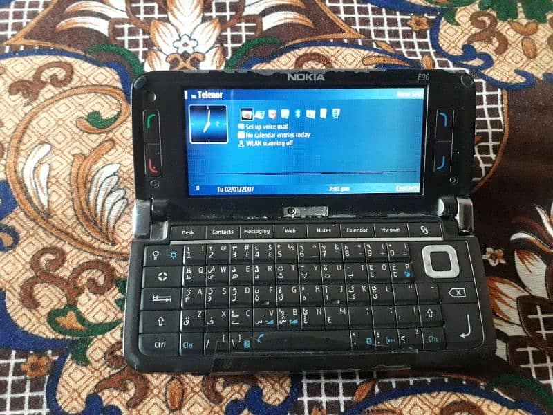 Nokia E90 all ok sim working non pta back cover nhi hai bs 7