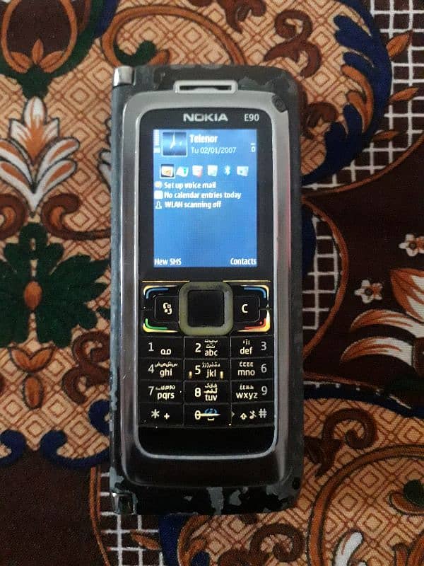 Nokia E90 all ok sim working non pta back cover nhi hai bs 8