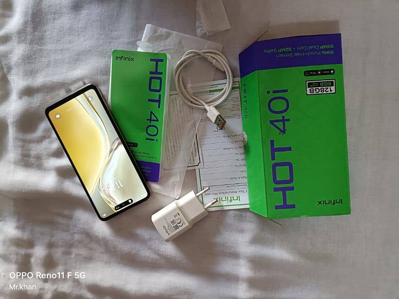 infinix hot 40i . 8gb 128 gb full box with orgnl chrgr 1