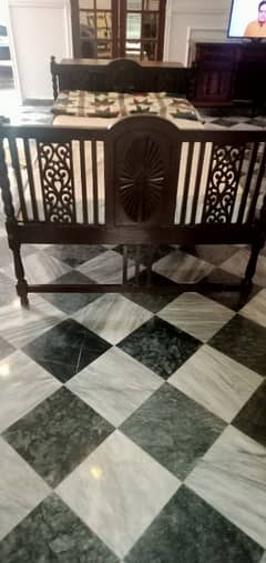 vintage palang solid wood single bed with dresser and a side table.