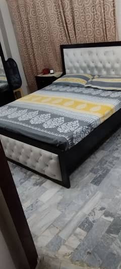 bed with  mattress ND one side table