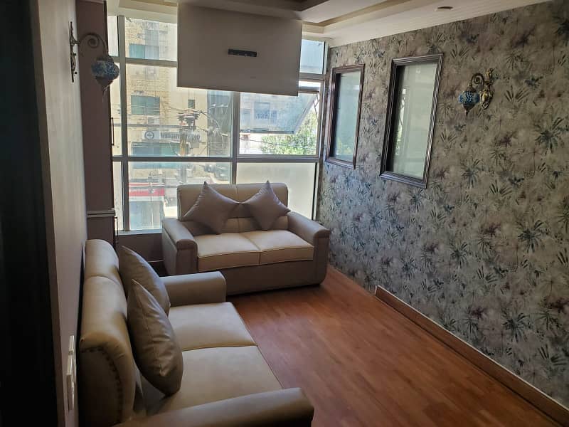 VIP LAVISH FURNISHED OFFICE FOR RENT WITH LIFT GLASS ELEVATION WITH EXCTIVE CHAMBER MAN ROAD FACING FRONT ENTRANCE RENT ALMOST FINAL NOTE 1 MONTH COMMISSION RENT SERVICE CHARGES MUST 1