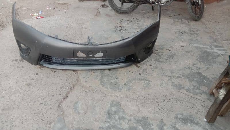 Toyota corolla 1.6 altus front bumper with fog lite holder 0