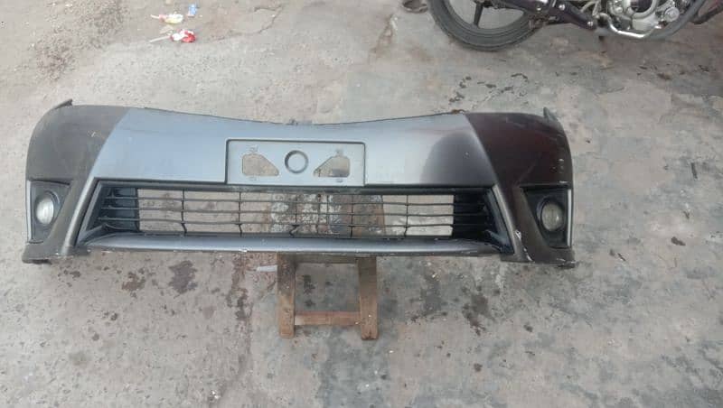 Toyota corolla 1.6 altus front bumper with fog lite holder 4