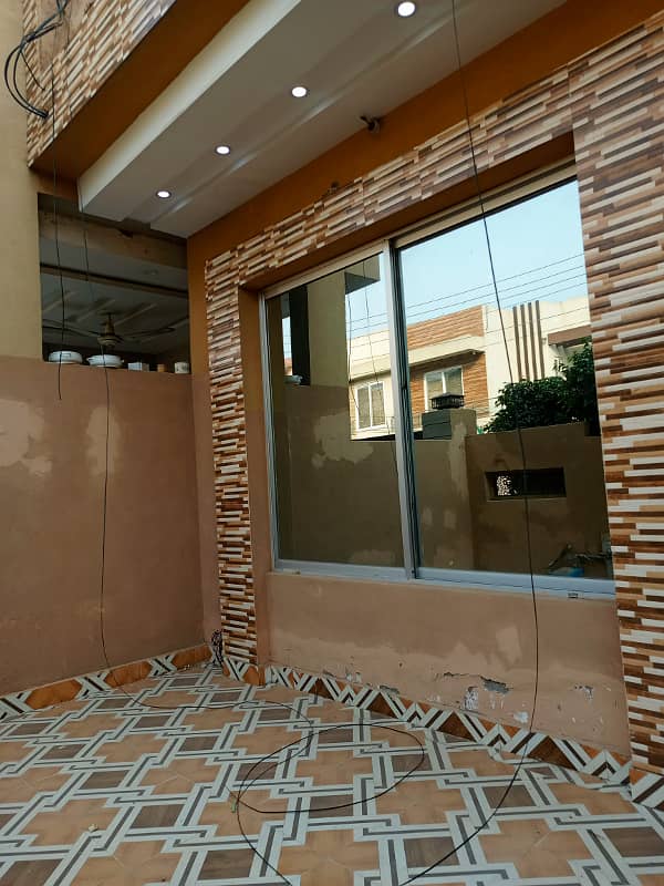 10 marla tile flooring new type single story house for rent in Revenue society for Family 1