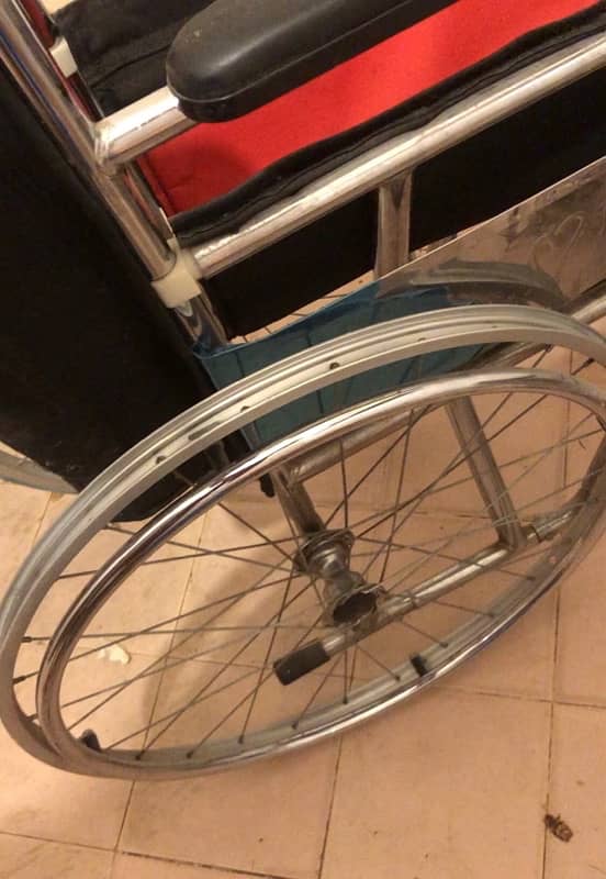 wheel chair new condition 2-3 used only 1