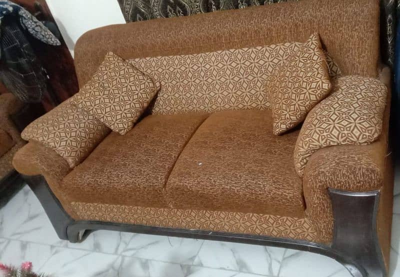 Brown sofa with brown cushion 1