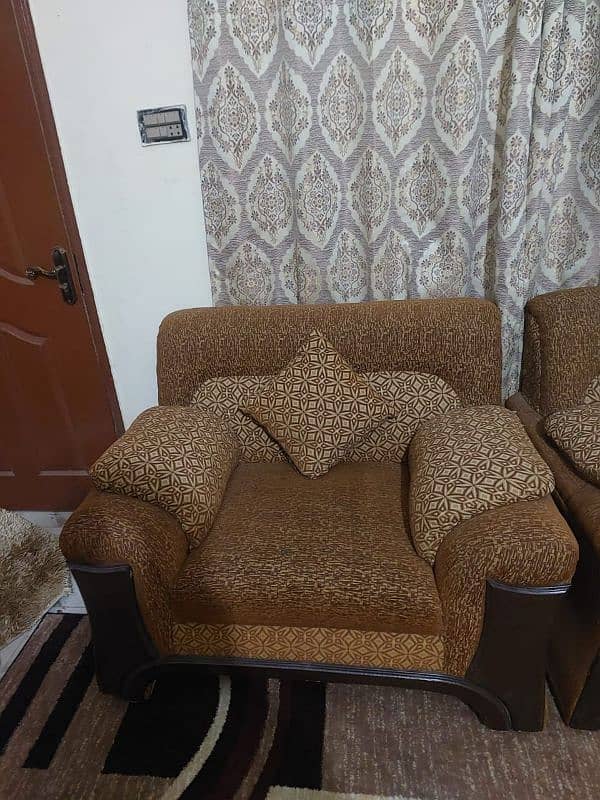 Brown sofa with brown cushion 2