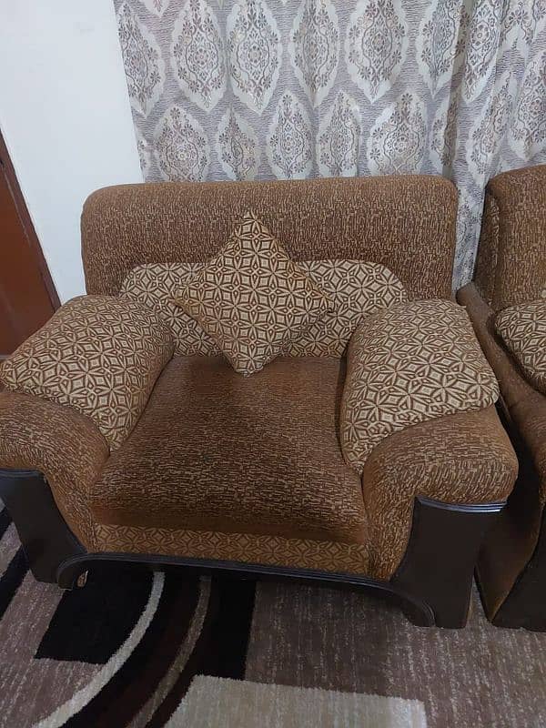 Brown sofa with brown cushion 3