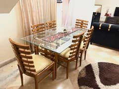 selling my 6 chairs dinning table pure shesham wood