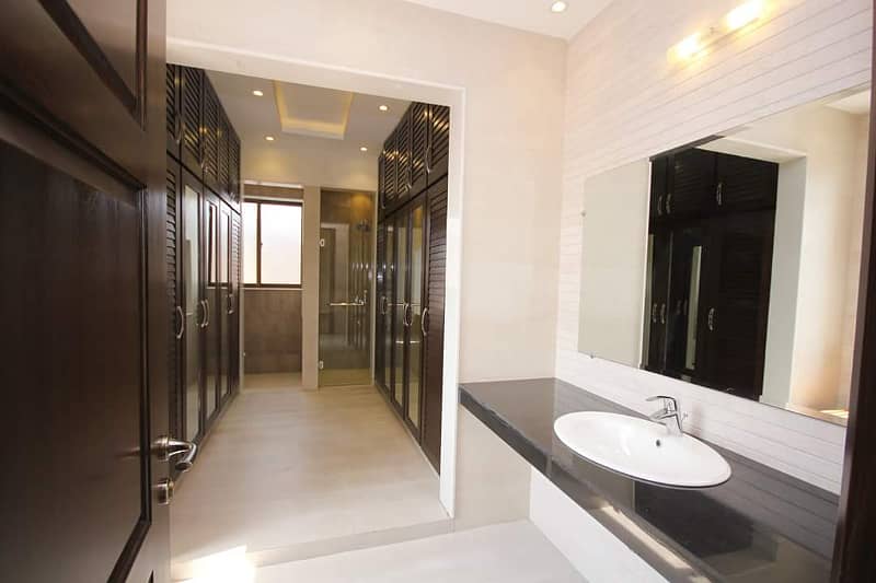 1 Kanal Slightly Used Unique Modern Design House For Sale in HBFC Society, Close to park near to DHA Phase 5 24