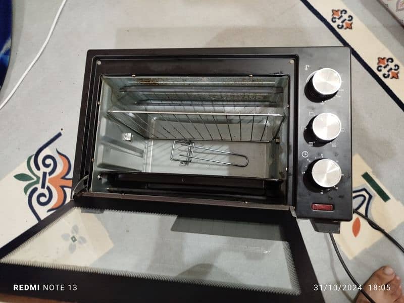 Geepas electric oven with rotisserie 1