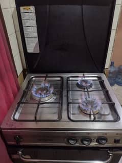 gas oven fully perfect 10/10 hai , iron stand 10/9 istari stand