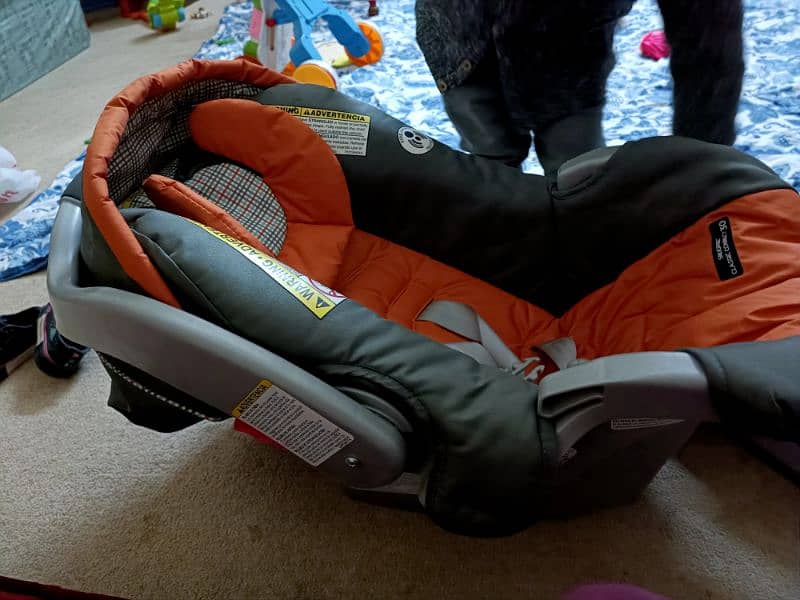 Brand new double stroller and a baby car seat 8