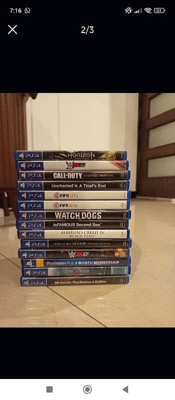 PS4 with 2 Controllers + 15 Games 2