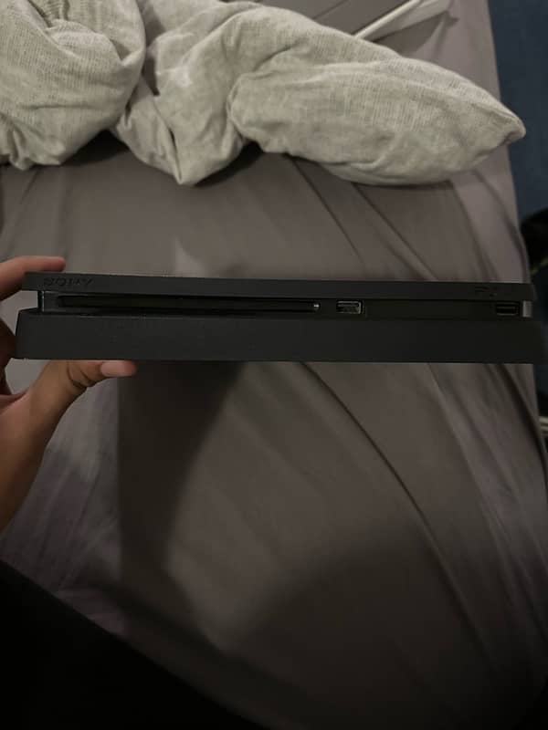 ps4 slim one tb for sale with 2 games and 2 controllers 0